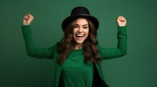 Young Beautiful Brunette Woman Wearing Green Hat On St Patricks Day Celebration Excited For Success With Arms Raised And Eyes Closed Celebrating Victory Smiling.