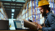 © DC Studio - Shipping manager for operations verifies cargo details on files, ensuring right information for merchandise shipment and delivery. Staff member examines shipment tags at trade facility.
