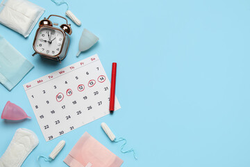 Canvas Print - Composition with menstrual calendar, different feminine hygiene products and alarm clock on color background