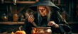 © TheWaterMeloonProjec - An elderly lady dressed as a witch prepares enchanted brews in a copper cauldron on Halloween.