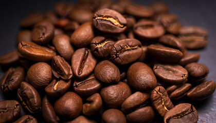 Wall Mural - Brown Roasted Coffee Beans Closeup On Dark Background