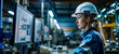 © Saulo Collado - Woman working wearing a hardhat by computer monitor in construction factory, data visualization.