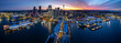© Stefan - Panoramic view of Auckland city skyline and waterfront at dusk