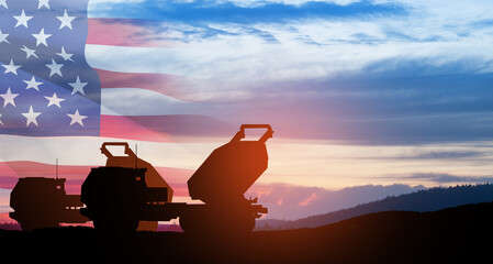 Wall Mural - Artillery rocket system are aimed to the sky at sunset with USA flag. Multiple launch rocket system.