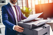© Nice Seven - Businessman print paper on a multifunction laser printer in business office. Document and paperwork. Secretary work. Copy, print, scan, and fax machine. Print technology. Photocopy