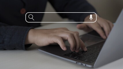 Wall Mural - data search technology search engine optimization. man's hands are using a computer notebook to sear