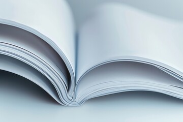 Canvas Print - An up-close view of an open book placed on a table. This image can be used to represent education, reading, or studying.