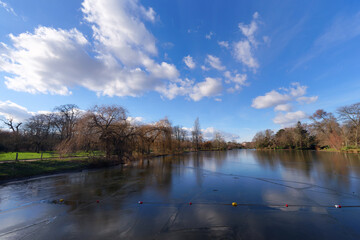 Poster - The frozen Daumesnil lake at Bois de Vincennes in the 12th arrondissement of Paris city