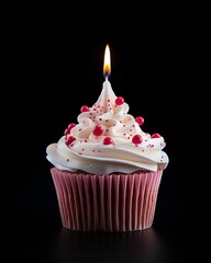 Wall Mural - a cupcake with one birthday candle isolated on white