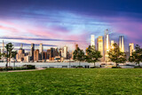 Fototapeta  - Great viewpoint of the Hudson River in New York (USA) enjoying the Big Apple Skyline and Manhattan buildings.