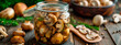 © yanadjan - Preserving mushrooms in jars. Selective focus.
