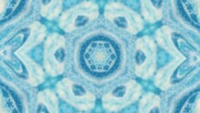 Glowing Mandala. Snowflake Kaleidoscope. Defocused Blue White Color Paint Water Star Shape Ornament Motion Abstract Art Background.