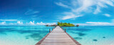 Fototapeta Most - wooden pier on tropical summer beach. Blue sky holiday banner. copy spce for text