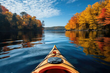 Kayak In Calm Lake With Autumn Trees And Blue Sky