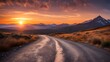 Capture the tranquility of a deserted mountain road bathed in the warm hues of a breathtaking sunset.