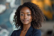 © Lorne Thomson - Elegant African American Businesswoman with Natural Hair