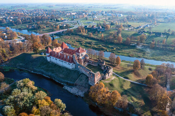 Wall Mural - Medieval castle from above, Bauska town aerial panorama with medieval castle