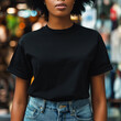 Black T-shirt Mockup, Black Woman, Girl, Female, Model, Wearing a Black Tee Shirt and Blue Jeans, Oversized Blank Shirt Template, Standing in a Clothing Store, Close-up View