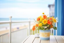 Bright Flowers Decorating A Seaside Balcony