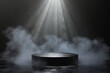 3d empty product display podium for presentations. A mysterious black pedestal display surrounded by fog with a single spotlight illuminating