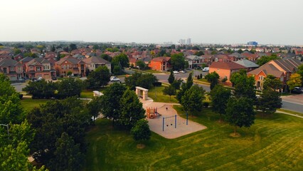 Real estate in a beautiful Australian suburb, showcasing homes for sale. Ideal for real estate listings, highlighting the appeal of house sales in tranquil suburban settings. Aerial view of suburban