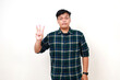 © ArvStd - Portrait of young adult Indonesian man standing while showing two fingers. Isolated on white