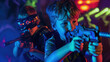 © Julia Zarubina - cheerful children playing laser tag, kids, shooting, laser gun, game, childhood, entertainment center, childhood, boy, girl, neon, sport, hobby, fun, party, birthday, people, portrait, weapon, war