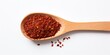 Spice Chili Pile In Wooden Spoon On White Background. Top View Of Red Pepper, Organic Dry Seasoning. Spicy Condiment