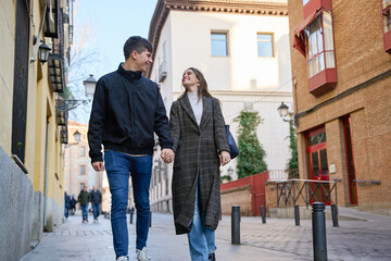 couple in love walking down the street