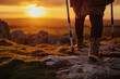 a closeup photo of a disabled person, who needs support walking with crutches. sunset and landscape in the background.