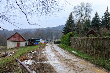 Wall Mural - Rural dirt road. Background with selective focus and copy space