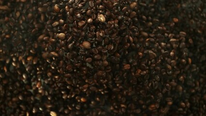 Aufkleber - Super Slow Motion of Flying Coffee Beans Isolated on Dark Background. Macro Shot. Filmed on High Speed Cinema Camera, 1000 fps.
