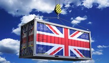 Freight Shipping Container With National Flag Of United Kingdom Hanging On Crane Hook - 3D Illustration