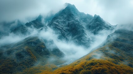 Wall Mural -  the top of a mountain covered in fog and low lying clouds in the foreground, with low lying clouds in the foreground, and low lying clouds in the foreground.