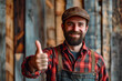 craftsman showing thumbs up sign, ps edit and sharpened