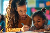 Fototapeta  - A woman is seen assisting a young girl with a pencil. This image can be used to depict education, learning, mentorship, or tutoring