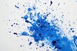 Blue paint splattered on a white surface. Suitable for artistic projects or backgrounds