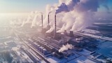 Fototapeta Nowy Jork - Industrial Plant Emitting Steam and Smoke in Winter Landscape