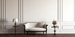 Elegant guest room with vintage furniture, white relief walls, and dark brown parquet floor.