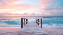  A Wooden Pier Leading To The Ocean With Waves Crashing On The Shore And A Pink And Blue Sky In The Background.