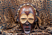 Wooden Tribal African Mask From Uganda, For Family Or Personal Protection, Made Of Local Wood, Ropes And Seashells As Hair Decoration