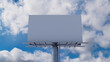 © RocknRoller Studios - Marketing Billboard. Blank Large Format Sign against a Cloudy Afternoon Sky. Design Template.