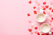 Coffee cup with hearts on pink background. Cup with hot drink. St Valentine's, Women's and Mother's day concept. Love and romantic. Card or banner with copy space
