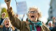© Barbara Taylor - senior citizen activist shouting for their cause among people demonstration protester, copy space