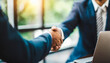 © Your Hand Please - Professional handshake between businessmen symbolizing agreement and partnership in a corporate setting