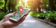 © Valeriia - Unrecognized hand holds smartphone with map icon. 3D Map pins, GPS, navigator pin checking points, 3D World Map icon, technology and application mobile, transportation concept