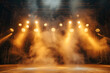 Stage lights and smoke on a dark background. The stage is illuminated by spotlights.