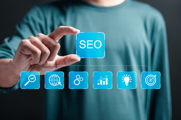 Wall Mural - seo concept, businessman touch virtual seo icons to analyze seo search engine optimization for promo