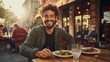 A handsome smiling man sitting at a table in a cozy Italian outdoor restaurant. Recreation, Entertainment, Lifestyle, Travel, Good time concepts.