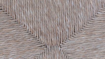 Background texture of brown straws chair weave pattern
